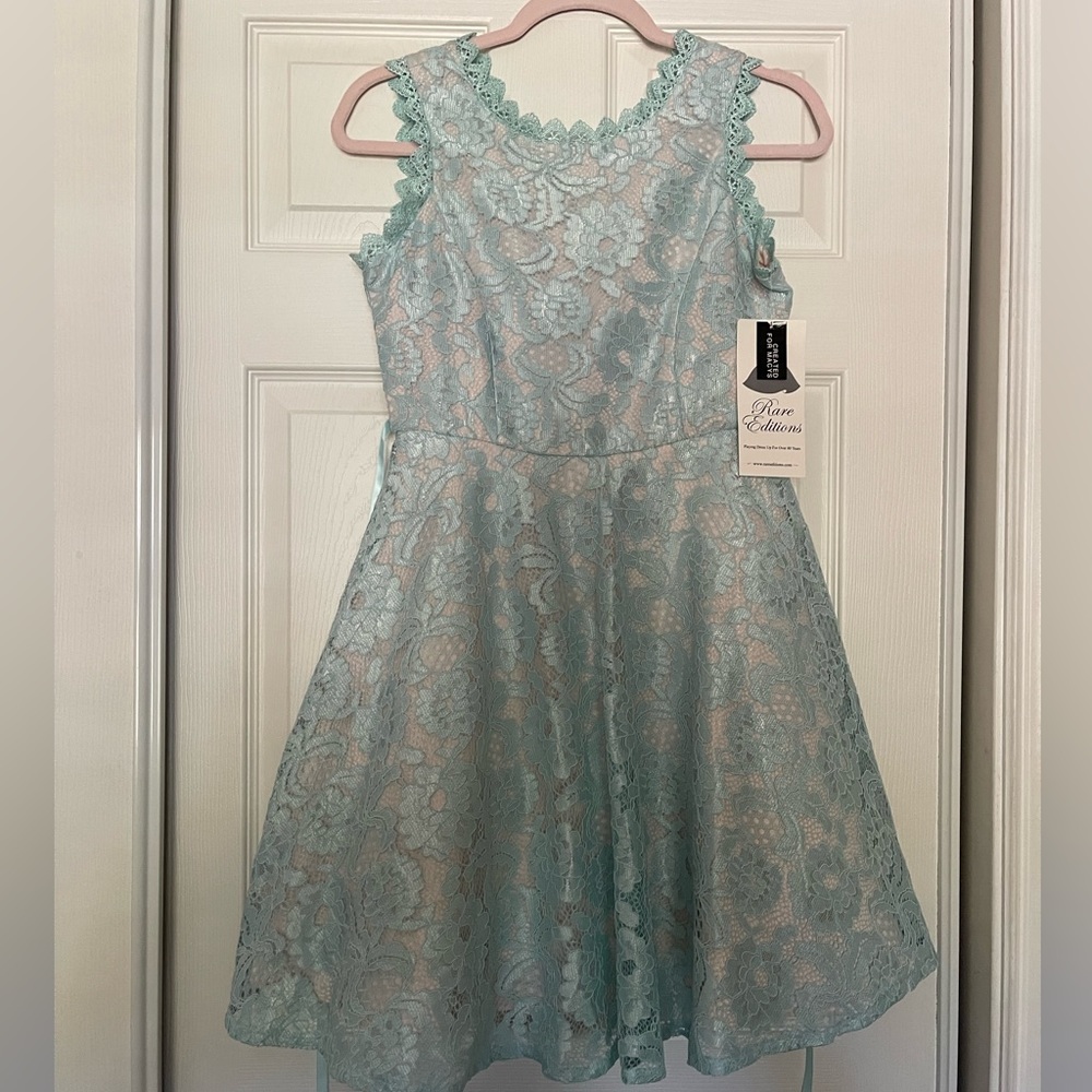 Girl dress in size 16 New with tag